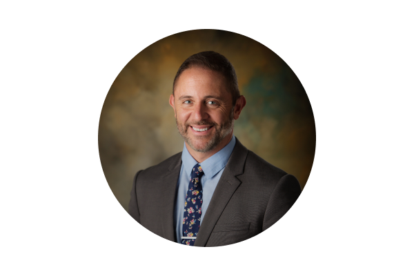 professional headshot of Tim Gill