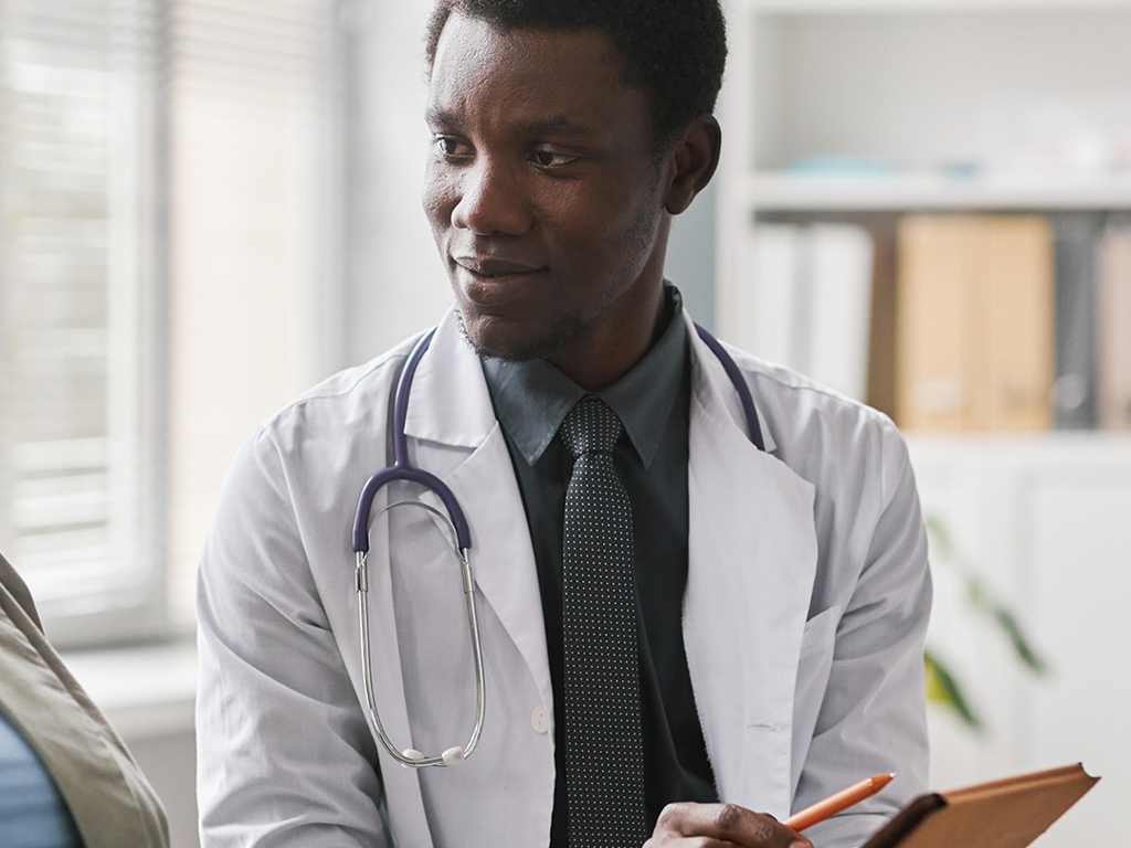 Doctor talking with patient