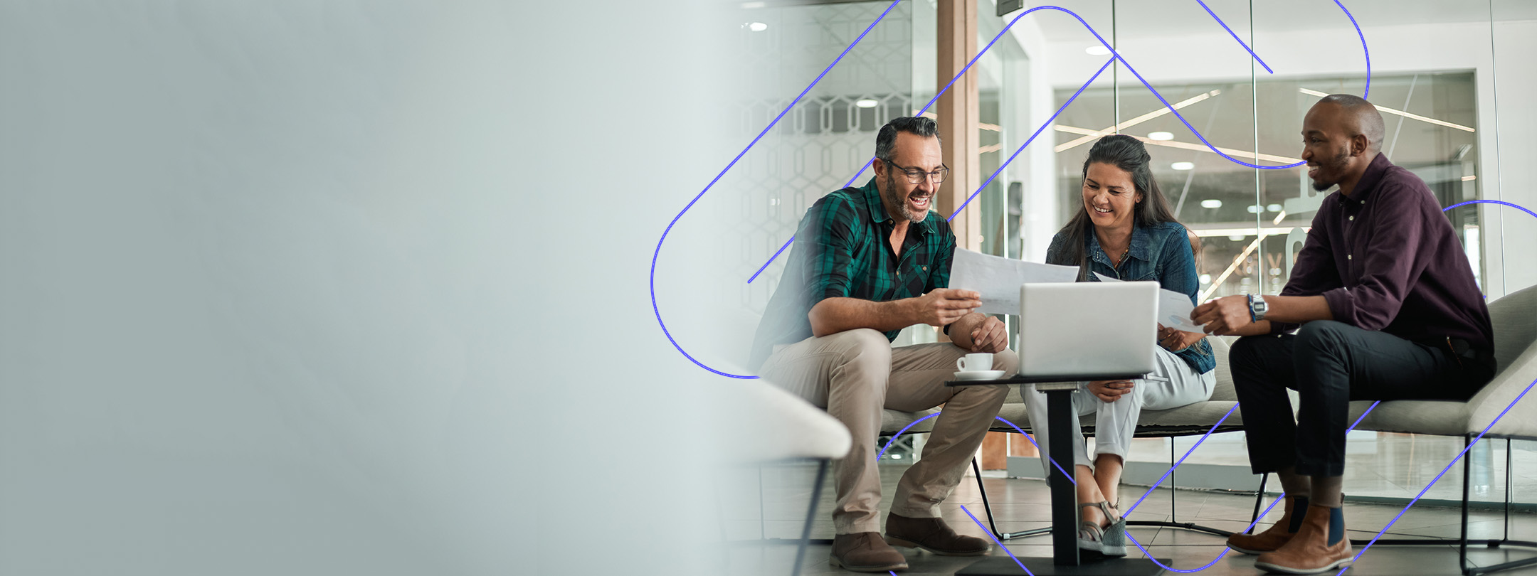Group of employees sitting at a table